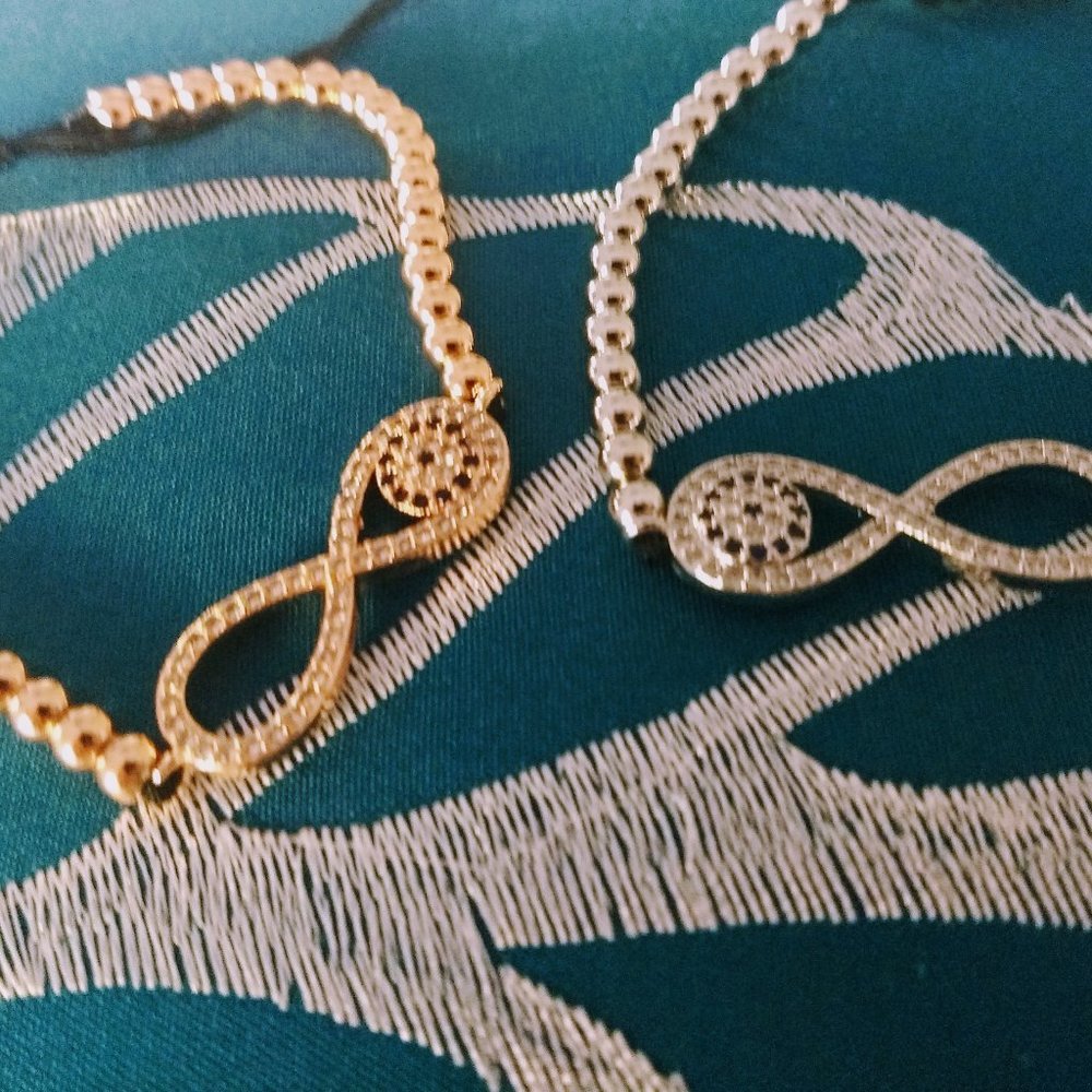 Lucky eye infinity bracelets, rose gold and silver
